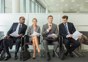 Business people sitting in waiting area