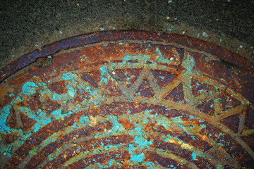 Curved arc of vintage city manhole background