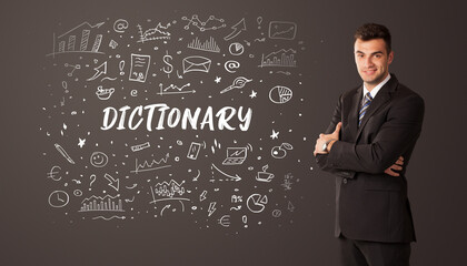 Businessman thinking with DICTIONARY inscription, business education concept