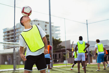 Soccer player training on field