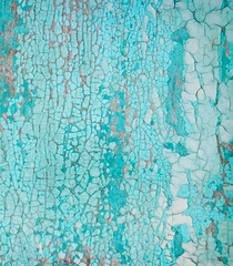 Obraz premium Old crackled painted wood surface. Vintage wooden wall or floor with cracked paint.