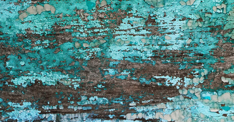 Old crackled painted wood surface. Vintage wooden wall or floor with cracked paint.