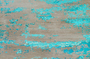 Old crackled painted wood surface. Vintage wooden wall or floor with cracked paint.
