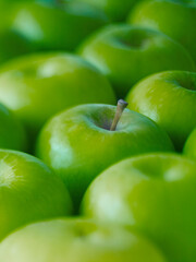 Extreme close up of whole green Granny Smith apples