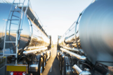 Stainless steel milk tankers side by side