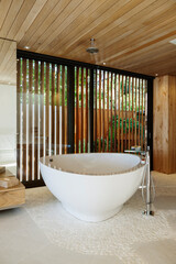 Modern soaking tub in bathroom