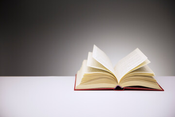 Close up of open book on counter