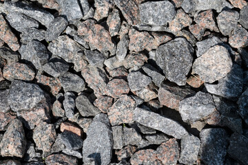 background of stones in the sun with shadows