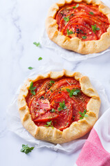 Homemade seasonal savoury summer tomato galette, tart, pie