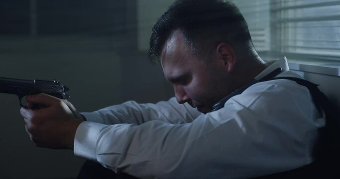 Young policeman crying during shootout