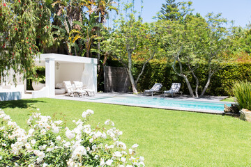 Swimming pool and backyard of modern house