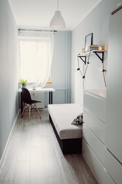 Bright interior of a modern student room at home, creative worker, interior design. Minimalistic workplace