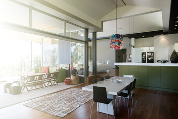Modern dining room interior with large table and chairs