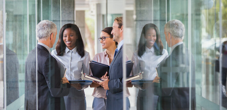 Business people talking in office building