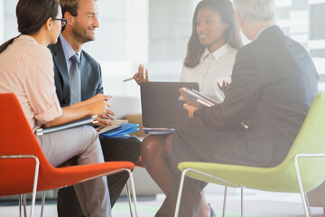 Business people having meeting in office building