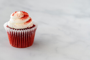 Single Red Velvet Cupcake on Marble