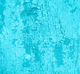 Cracked painted blue teal board with texture and grunge finish