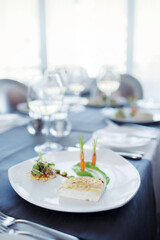 Fancy fish meal on plate in restaurant