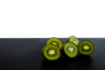 close up on sliced ​​fruit kiwi, white background