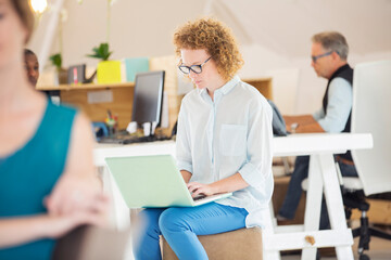 Fototapeta premium Woman and man sitting and working in office