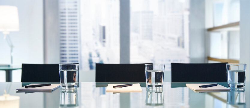 Part Of Modern Conference Room Table Chairs, Pens Glasses Water