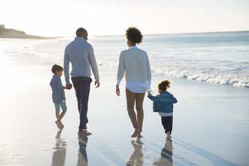 Happy family having fun on beach