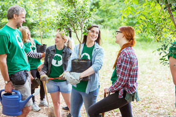 Environmentalist volunteers planting new trees