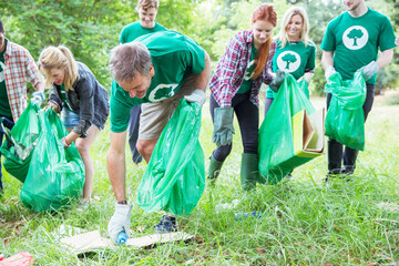 Environmentalist volunteers picking up trash