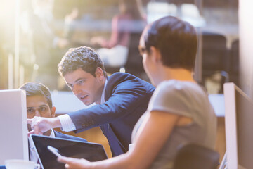 Business people working at computer in office