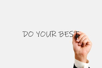 male hand of a businessman writes with a marker Do your best