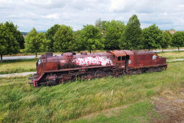 Old train cemetery. Aerial view of an old abandoned rusty steam train. High quality 4k footage