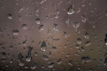 drops of water on a glass surface. background