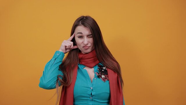 Forefingers temples. Playing the fool. Out of mind, displeased with reckless silly joke. Crazy, making stupid sign finger near head, gesturing bad think, dumb insane idea, dissatisfied senseless talk
