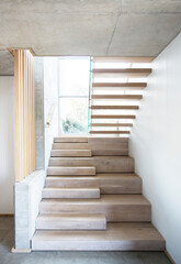 Fototapeta na wymiar Modern staircase in luxury house