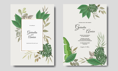  Wedding invitation card template set with tropical leaves decoration Premium Vector