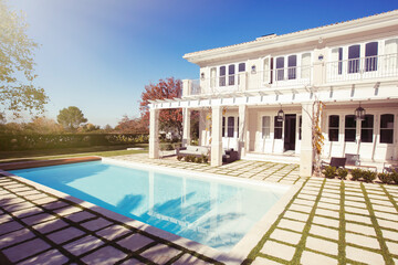 Fototapeta premium Swimming pool outside luxury house