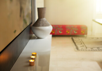 Candles on foyer table © Tom Merton/KOTO