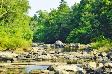 Kerala tourism - rocks in a stream at kuruwa island " kuruva dweep " situated in wayanad district, kerala, india