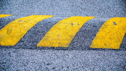 Speed bumps in a Road are the common name for a family of traffic calming devices that use vertical...