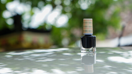 Black nail polish bottle