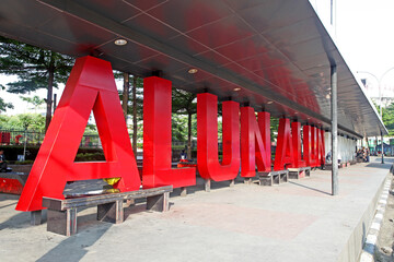Alun Alun is a grassed area in downtown Bandung City, Indonesia in frint of the Grand Mosque and...