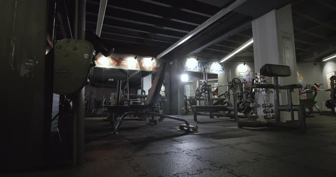 A wide and cinematic scene showing an empty fitness studio during times of the corona virus.