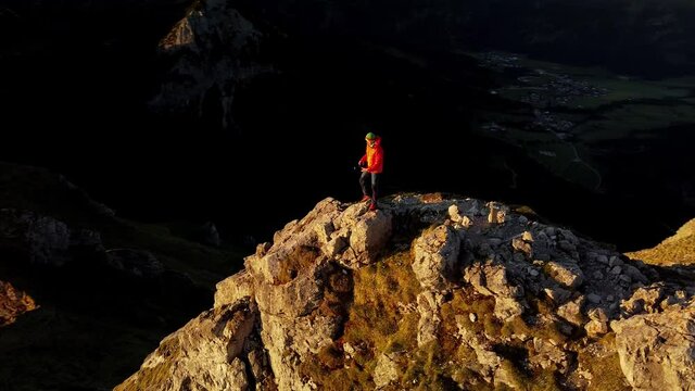 Photographer on Summit at sunrise Drone Prarallaxe