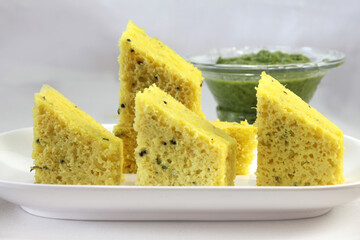 Khaman Dhokla is very popular  Steam cooked Gujarati snacks made from Bengal gram[Chana Dal] and served with chutney.