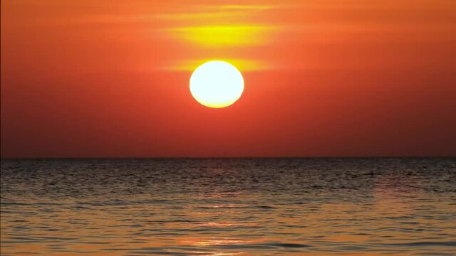 4K sea video, red sky, yellow sun and incredible sea sunset, sunsets on the Atlantic beach
