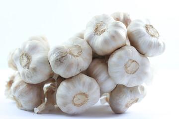 Group of garlic on white background