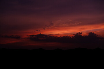 sunset light yellow gold sky evening with mountain
