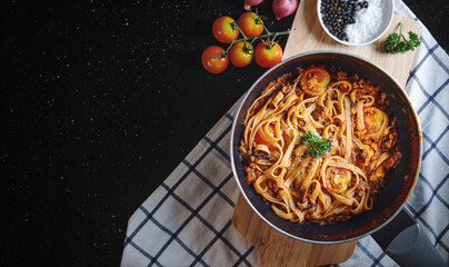 Pasta Bolognese tomatoes sauce, with fresh ingredient. Left Copy Space