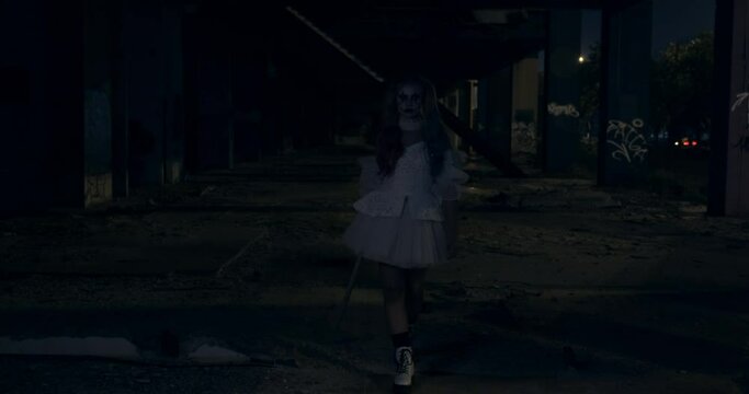 Scary Cosplayer Emerging from the Dark Then Strikes a Pose