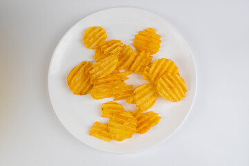 Beer snack chips on a white background close-up